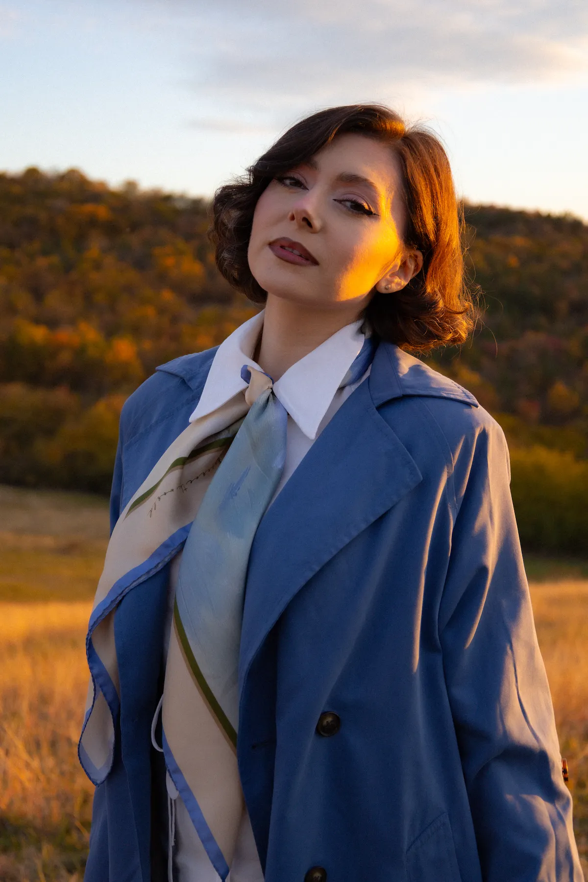 A picture of Maria, the founder of the Marlume brand, showcasing the scarf 'Finding Interior Peace'.